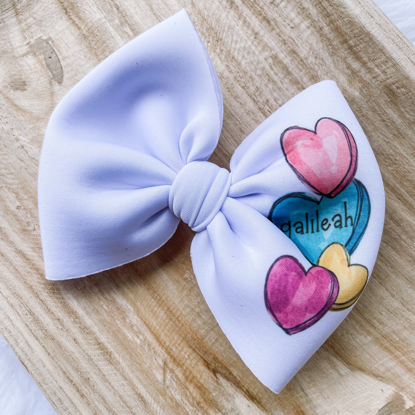 CANDY HEART NAME BOW